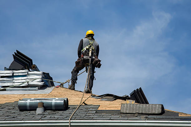 Professional Roof Replacement technician working in Hurley, WI